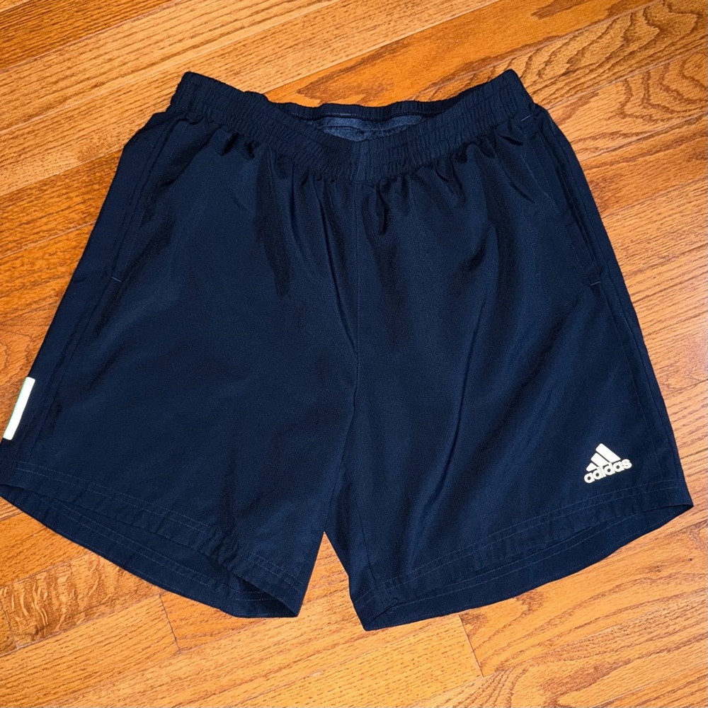 Men’s Adidas 7” Running Shorts.